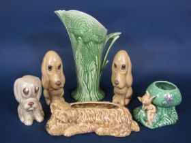 A collection of Sylvac wares comprising a pair of humorous dome headed dogs with impressed numbers