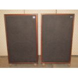 A pair of Heathkit hi-fi speakers model AS-9530 with teak veneered cases and raised on shepherds