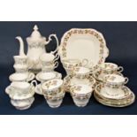 A collection of Aynsley April Rose pattern tea wares comprising milk jug, cake plate, six cups, five