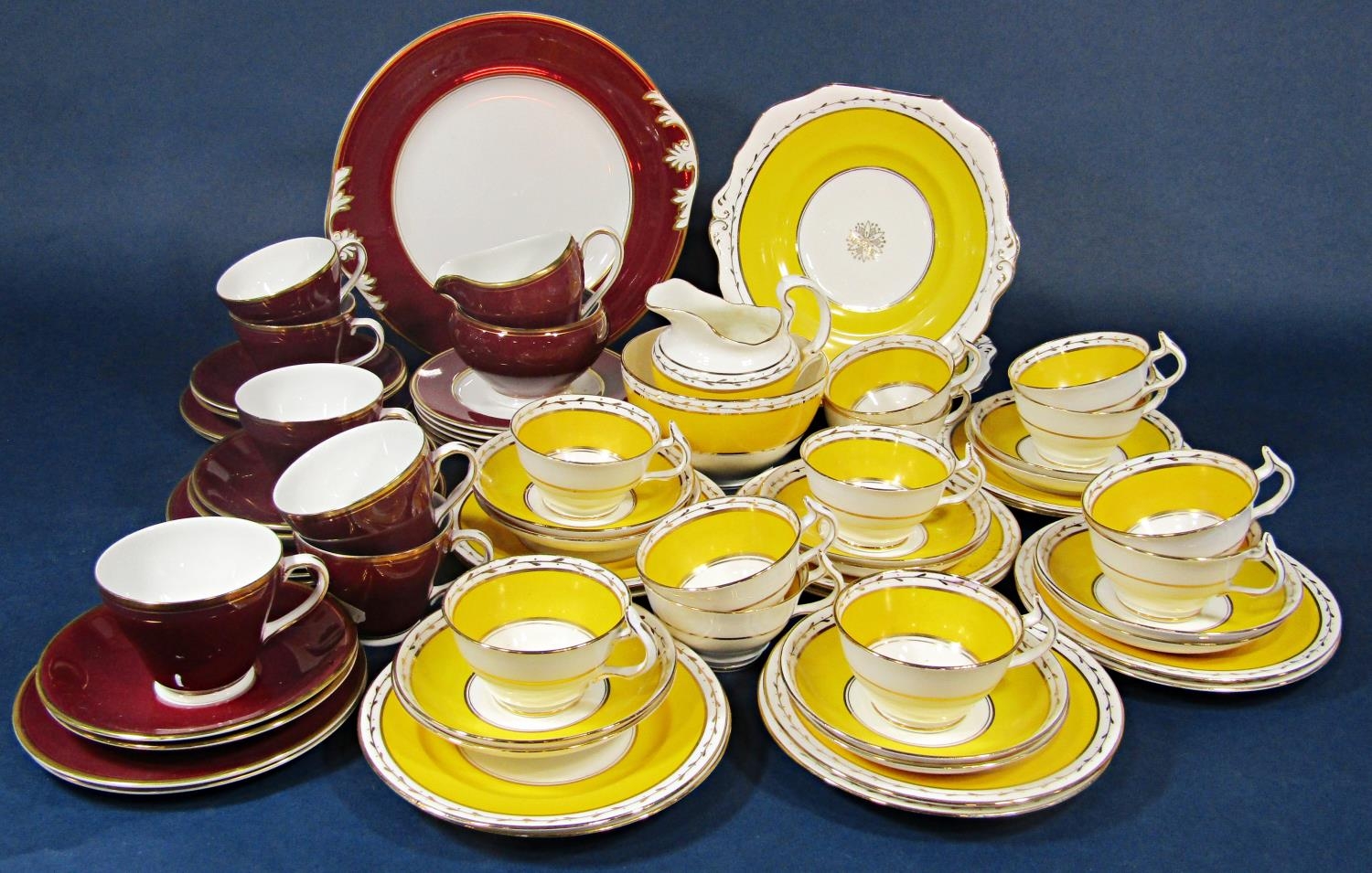 A collection of Wetley China yellow and gilt tea wares including milk jug, slop bowl, pair of cake