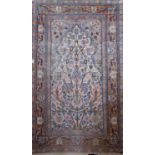 Good quality antique Persian silk blend rug, with tree of life type decoration upon an ivory ground,