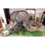 A large collection of silver plated items to include wine coaster, large centre bowl with pierced