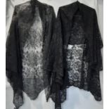 Three black 19th century shawls; first is a triangle shape worked on gauze with scalloped edge 270 x