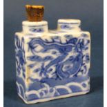 A 19th century oriental blue and white twin aperture scent bottle with dragon detail, with blue