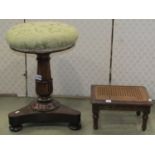 A Victorian rosewood piano/music stool with circular upholstered revolving and adjustable seat
