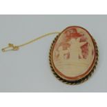 Vintage 9ct cameo brooch depicting playful Putti in a garden, 5.3cm L approx, 18.8g