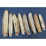 7 Georgian and later silver bladed fruit knives with mother of pearl casework and a Georgian