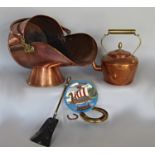 A 19th century copper coal scuttle, copper kettle, coal shovel, decorative horseshoe and a