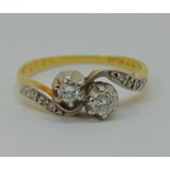 18ct gold and platinum diamond crossover ring, size K, 2.8g