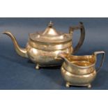 George III silver boat shaped part tea service comprising teapot and cream jug, maker Samuel