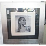 Monochrome photographic print of Ursula Andress as Honey Rider in James Bond film Dr No. signed