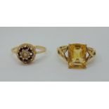 Two 9ct gem set dress rings to include a stylised citrine example, 5.2g total (one garnet vacant)