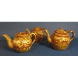 Antique North Lancashire set of three unusual double spouted slipware teapots with marbled glaze and