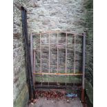 A Edwardian anodised brass single bedstead with square cut and arched rails (AF)