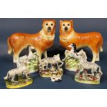 A collection of 19th century Staffordshire models of zebra, mostly with some damage (maximum