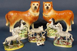 A collection of 19th century Staffordshire models of zebra, mostly with some damage (maximum