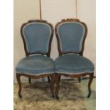 A pair of 19th century rosewood occasional/salon chairs with upholstered seats and backs within