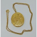 Vintage 9ct locket necklace with engraved scrolled decoration, maker 'NBs', Birmingham 1972, 16g
