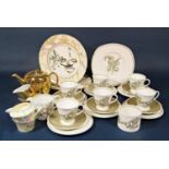 A collection of Wedgwood Susie Cooper design Iris pattern teawares comprising cake plate, milk