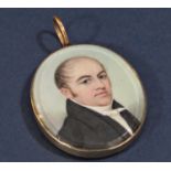 Mid 19th century portrait miniature, gentleman in a black jacket and white collar, to the reverse