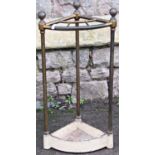A brass floorstanding and bowl fronted corner umbrella stickstand with tubular frame raised on a