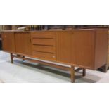A Scandinavian long and low teak sideboard, Troeds model designed by Nils Jonsson, fitted with a