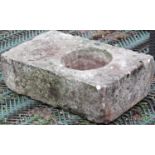 A weathered natural stone block with carved circular tapered cut out/drainage hole? 61 cm long x