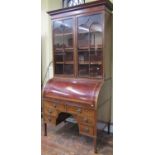 A good quality 19th century mahogany cylinder bureau bookcase, fitted with an arrangement of six