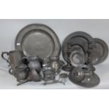 Six Georgian pewter plates (graduated) four tankards, funnel, candle snuffers, tobacco jar,