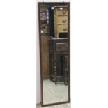 An Edwardian full length dressing mirror of rectangular form in the Georgian style, 131 cm x 40 cm