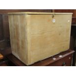 A 19th century stripped and waxed pine box with rising lid, 65 cm wide x 48 cm in height