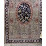 Fine quality Persian Kashmir half million knots Qum rug with central still life of birds and animals