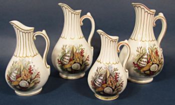 A pair of 19th century Pratt ware jugs with printed shell and coral detail, 26cm tall, together with