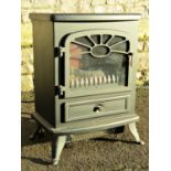 A focal point electric log effect fire/heater, model number ND1801, 42 cm wide