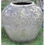 A large reclaimed oviform garden urn/jar, with moulded rim (af) approx 75cm diameter x 70cm high