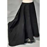Side saddle habit (skirt only) in black woollen serge with button and added press stud fastening,