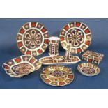A collection of Royal Crown Derby imari pattern wares no 1128 comprising a pair of plates, 22cm