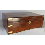 A Victorian rosewood brass banded travelling writing box, fitted interior with two glass inkwells,