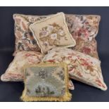 6 needlepoint cushions, most velvet backed, together with a basket of curtain tie-backs