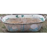 A vintage oval galvanised two handled bath with later painted finish and adapted as a planter, 118