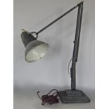 An early angle poise perforated lamp serial number 1227, bearing the makers name Herbert Terry &