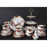 A collection of Royal Albert Old Country Roses pattern wares comprising a three tier cake stand, tea