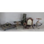 Miscellaneous collection of items including a mantel clock, postage scales, inkwell, gunsight etc