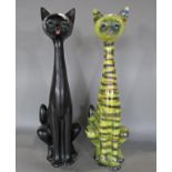 Two Jema Dutch figures of seated cats with elongated necks, one with striped glaze finish and the