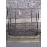 A 19th century wirework nursery guard with simple folded brass rail and curb, 100 cm wide x 92 cm