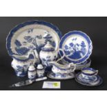 A collection of Booths Real Old Willow pattern wares comprising an oval serving plate, 44cm