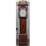 A Georgian oak and cross banded longcase clock, with reeded and moulded trunk and arched hood,