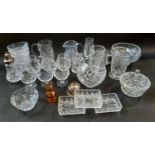 A selection of cut glass bowls, glasses including brandy glasses and tankards, etc.