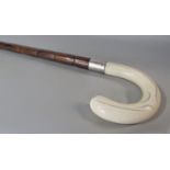 An ivory handled bamboo walking stick bearing a dedication to "Rev A. Mallinson" to the silver