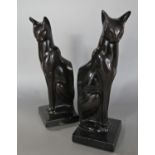 A pair of bronze Siamese cat book ends, 20.5 cm tall